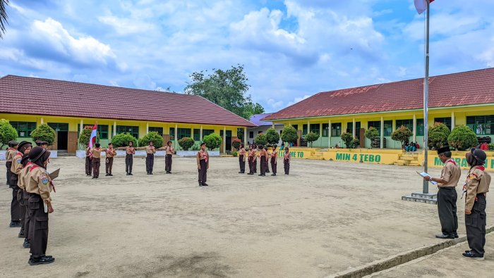 Mencium Merah Putih: Pelantikan Penggalang Ramu dan Terap MIN 4 Tebo Berlangsung Khidmat Mencium Merah Putih: Pelantikan Penggalang Ramu dan Terap MIN 4 Tebo Berlangsung Khidmat